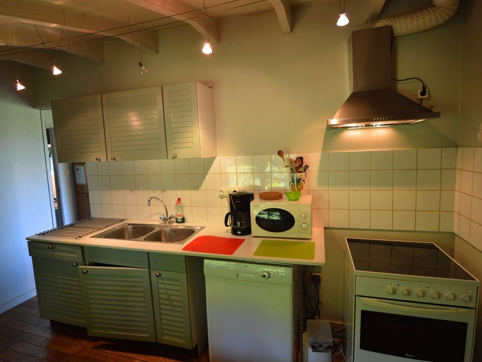 Chalet | Private kitchen | Stovetop, highchair