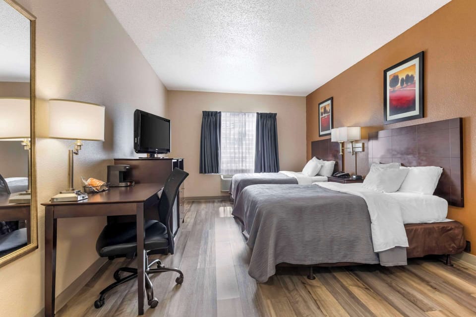 Standard Room, 2 Queen Beds, Non Smoking | Individually furnished, desk, laptop workspace, blackout drapes