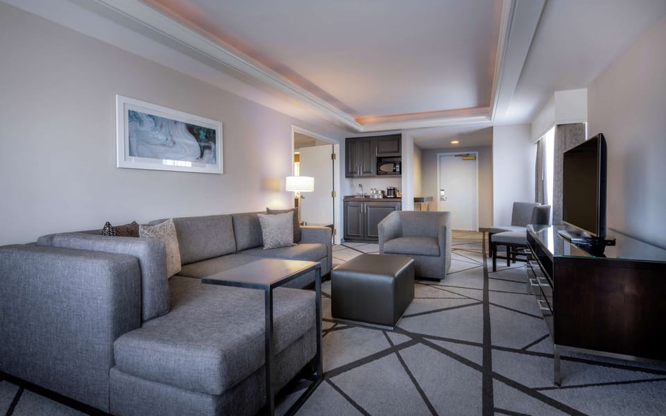 Suite, 1 King Bed | In-room safe, desk, laptop workspace, iron/ironing board