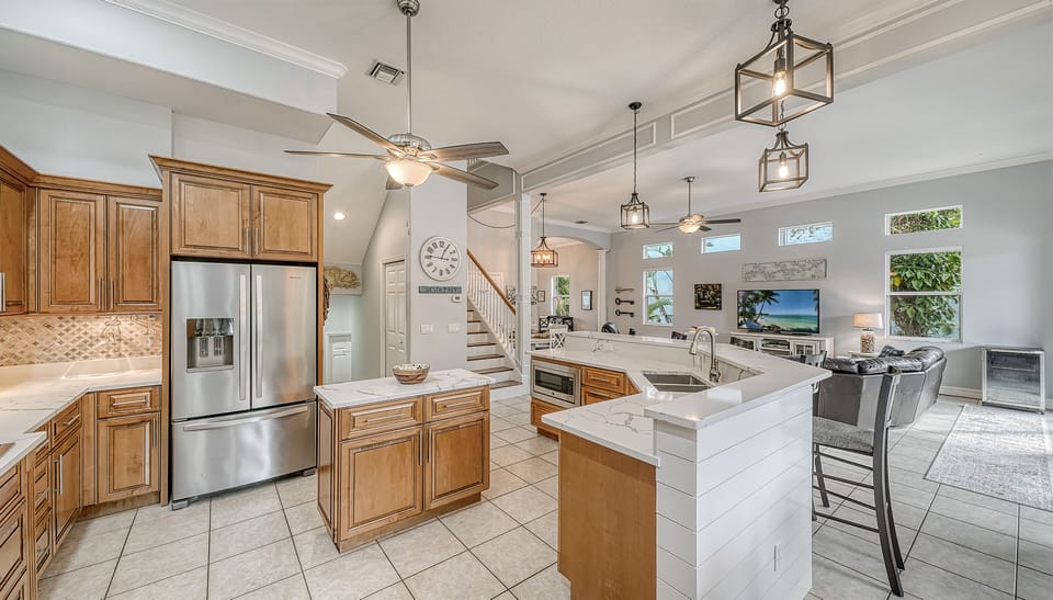 Bright, breezy, and beautifully equipped—this spacious kitchen invites you to cook, connect, and linger a little longer.
