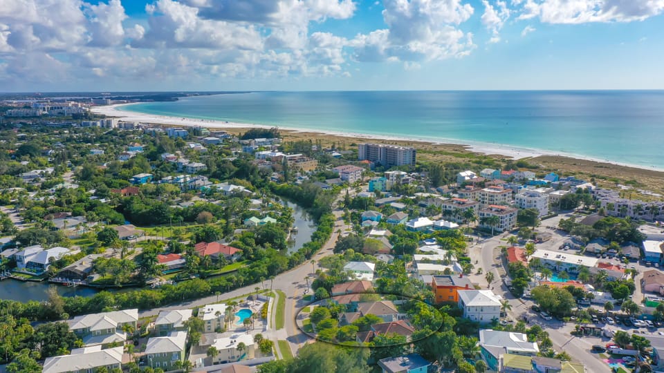 Just steps from Siesta Key Beach—this is your home base for sun, surf, and salt‑kissed breezes.