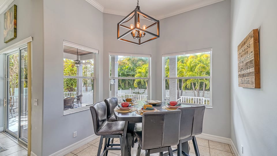 Gather here under gentle light—meals transform into stories, laughter, and lingering memories.