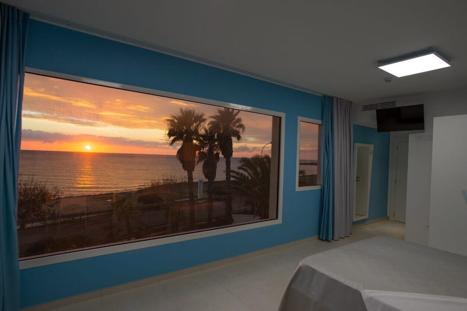 Deluxe Room, Sea View | Minibar, in-room safe, individually furnished, desk