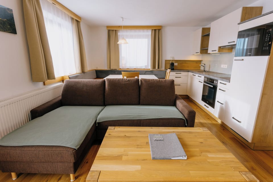 Comfort Condo, 2 Bedrooms, Balcony, Mountain View | Living area | 55-inch flat-screen TV with satellite channels, TV, toys