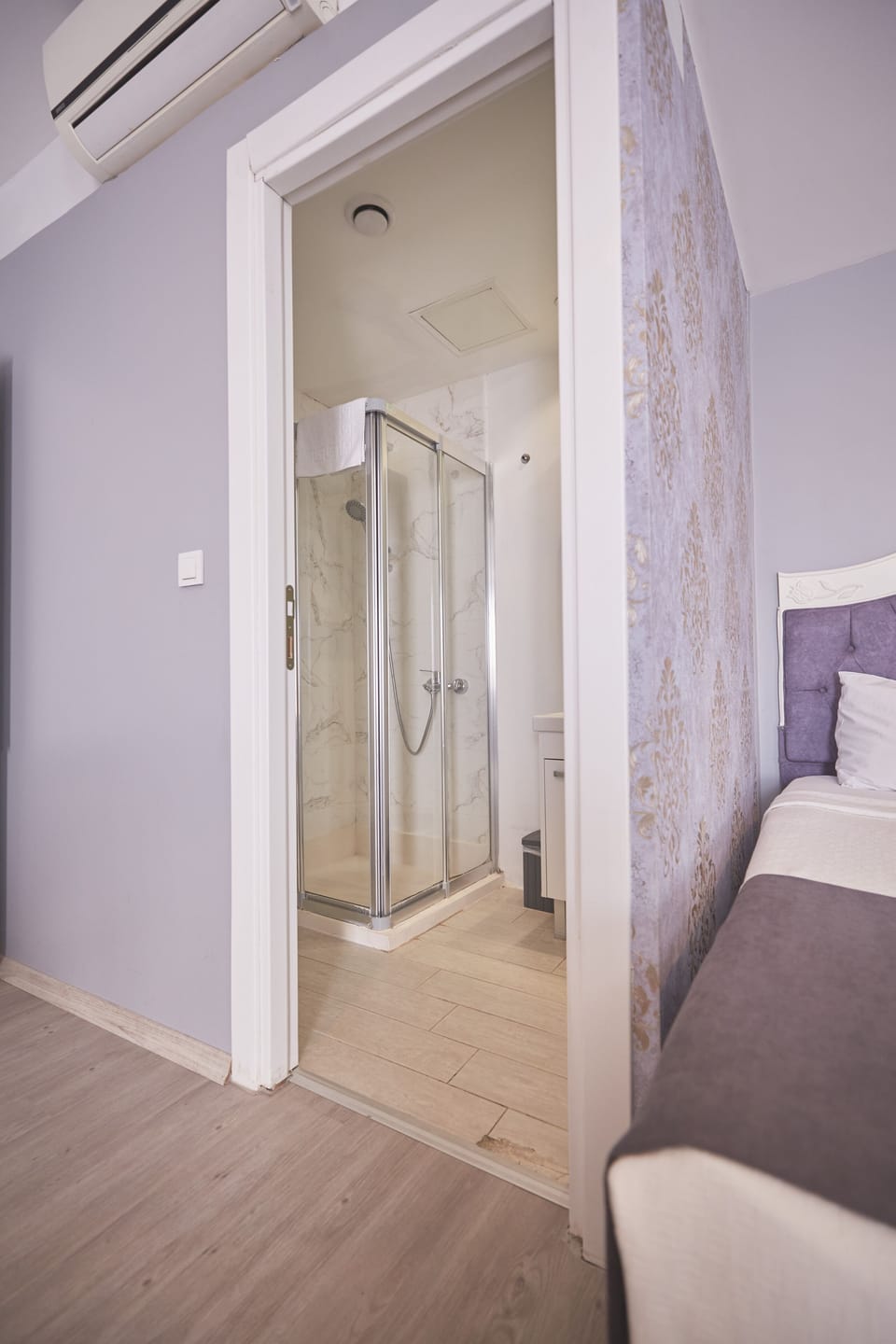 Family Room, 2 Queen Beds, Balcony, Partial Sea View | Bathroom | Shower, rainfall showerhead, free toiletries, hair dryer