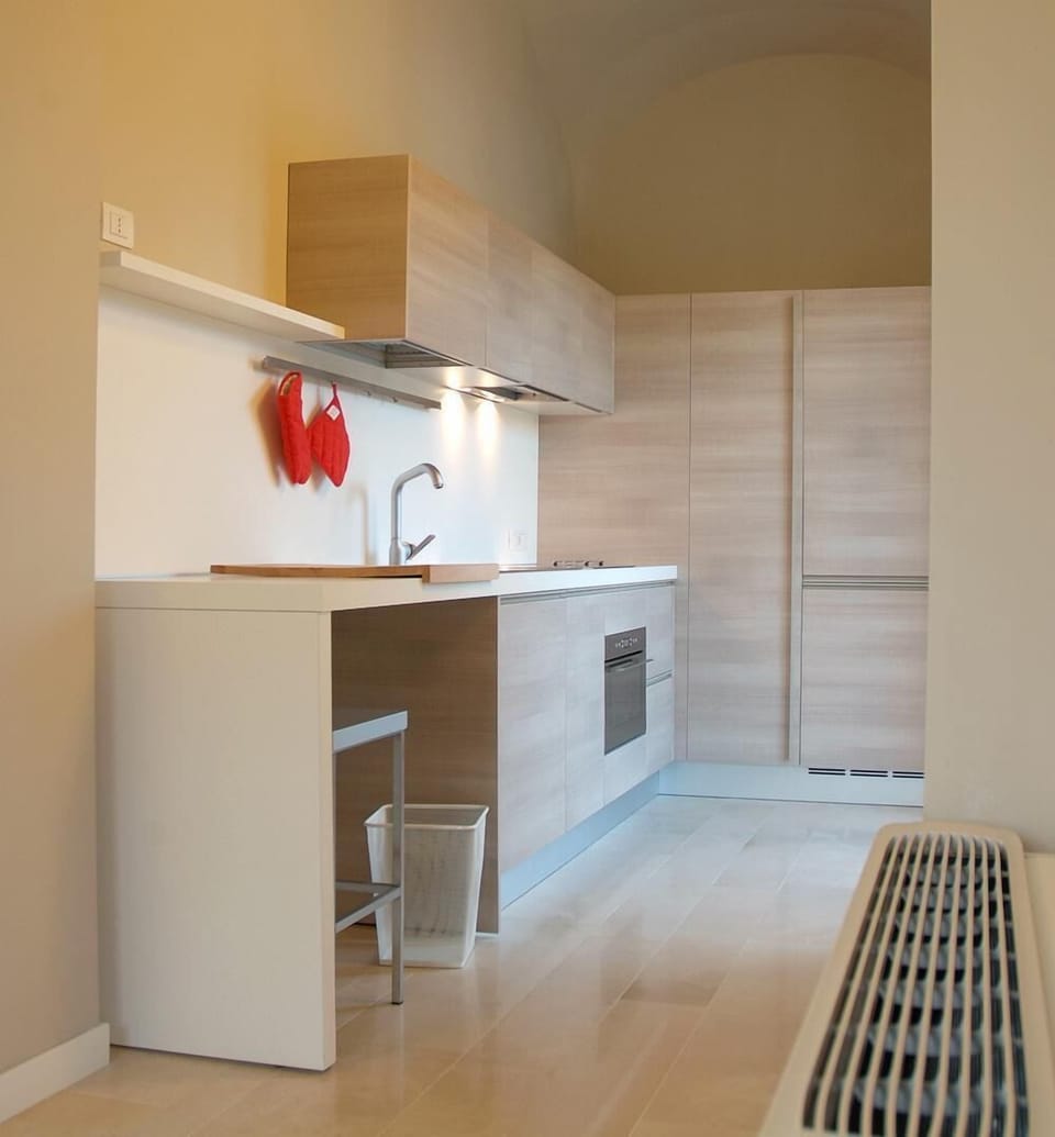 Junior Suite | Private kitchenette | Full-size fridge, oven, stovetop, dishwasher