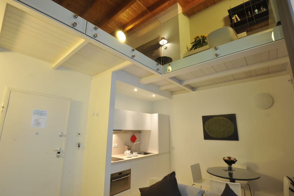 Deluxe Apartment | Down comforters, memory foam beds, in-room safe, desk