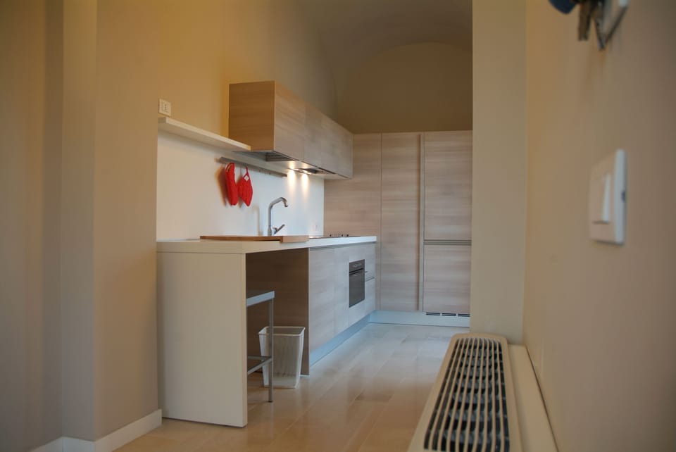 Junior Suite | Private kitchen | Full-size fridge, oven, stovetop, dishwasher