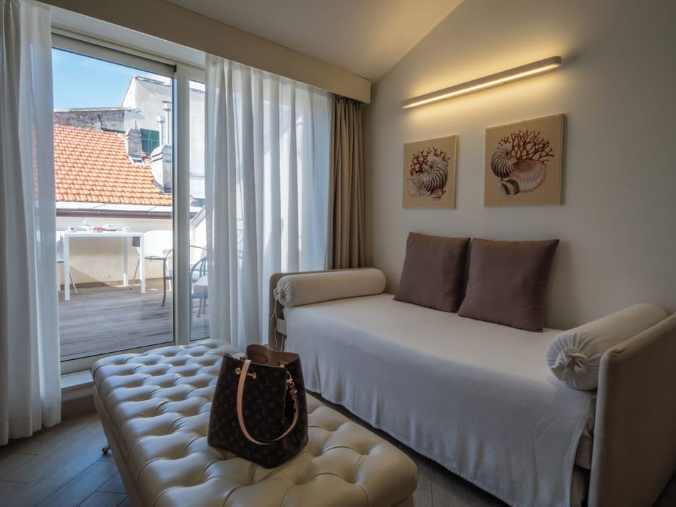 Junior Studio Suite, Hot Tub, Partial Sea View | Premium bedding, down comforters, minibar, in-room safe