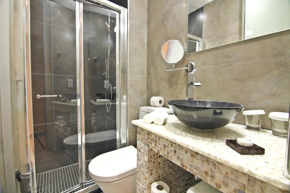 Shower, free toiletries, hair dryer, towels