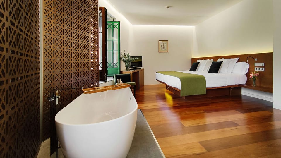 Designer toiletries, hair dryer, bathrobes, slippers