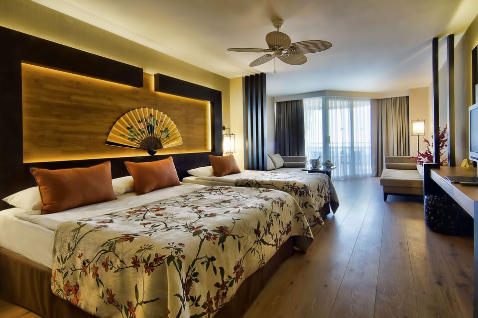 Egyptian cotton sheets, premium bedding, down comforters, free minibar