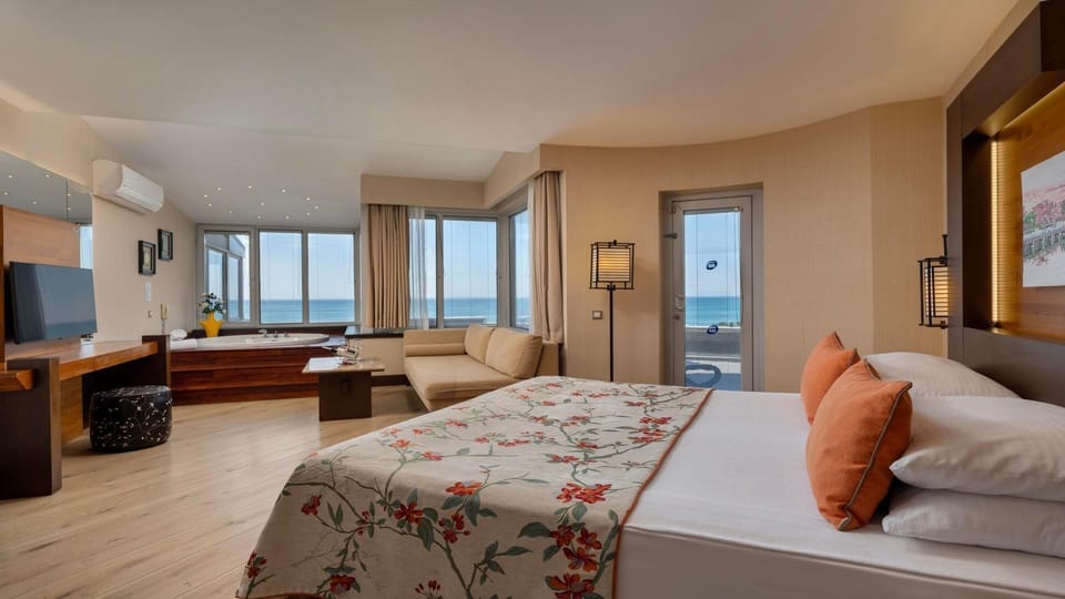Egyptian cotton sheets, premium bedding, down comforters, free minibar