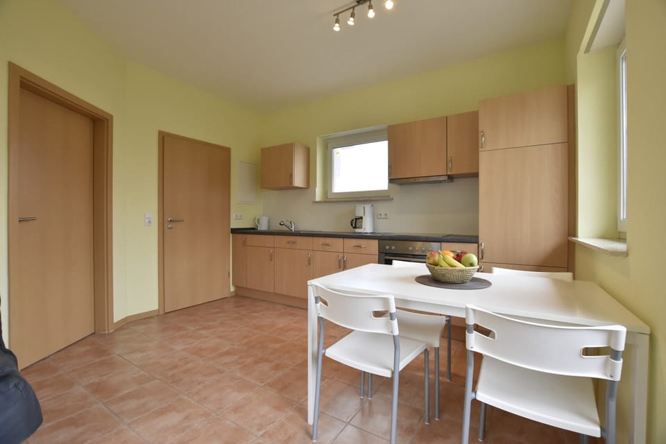 Apartment | Private kitchen | Electric kettle, highchair