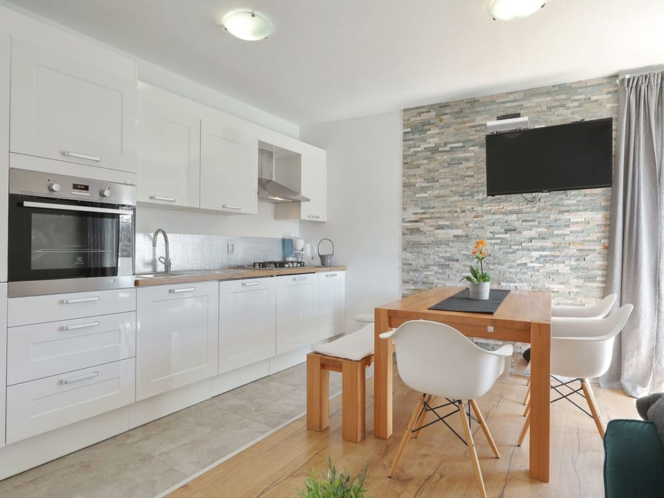 Villa | Private kitchen | Dining tables