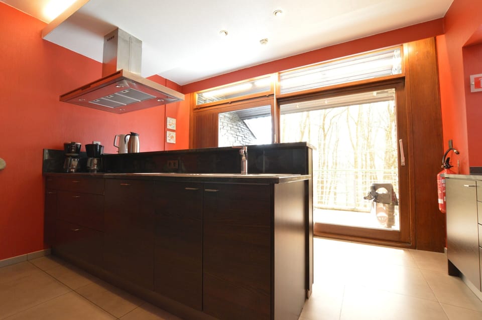 Villa | Private kitchen | Fridge, highchair