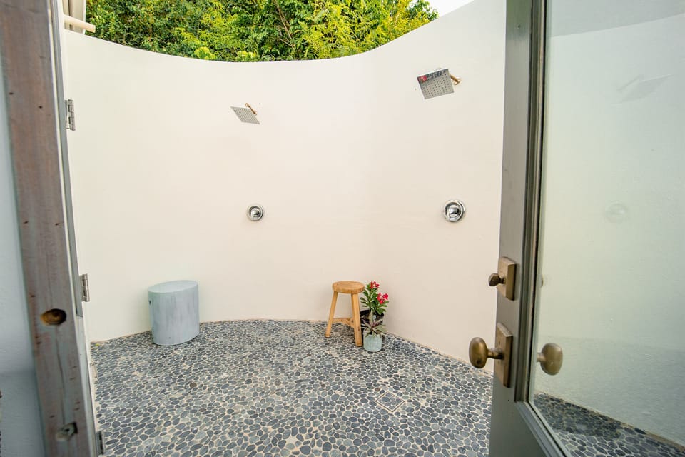 BATHROOM 1: Primary Suite outdoor shower