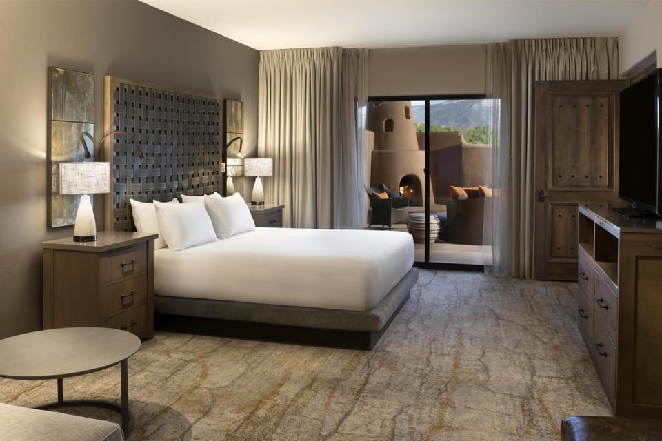 Premium bedding, down comforters, pillowtop beds, in-room safe