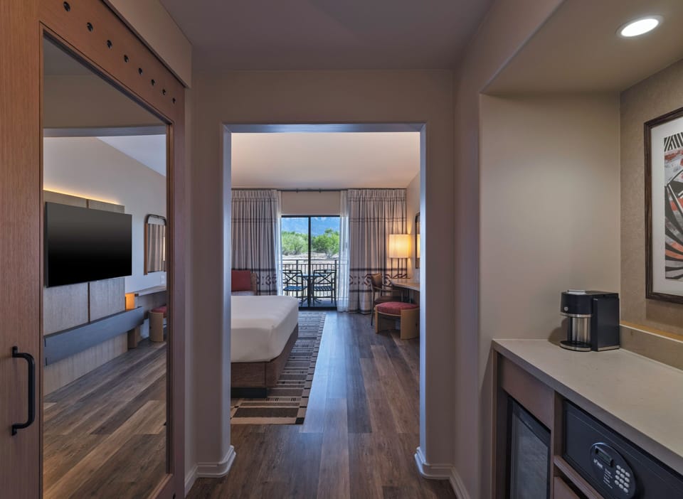 Premium bedding, down comforters, pillowtop beds, in-room safe