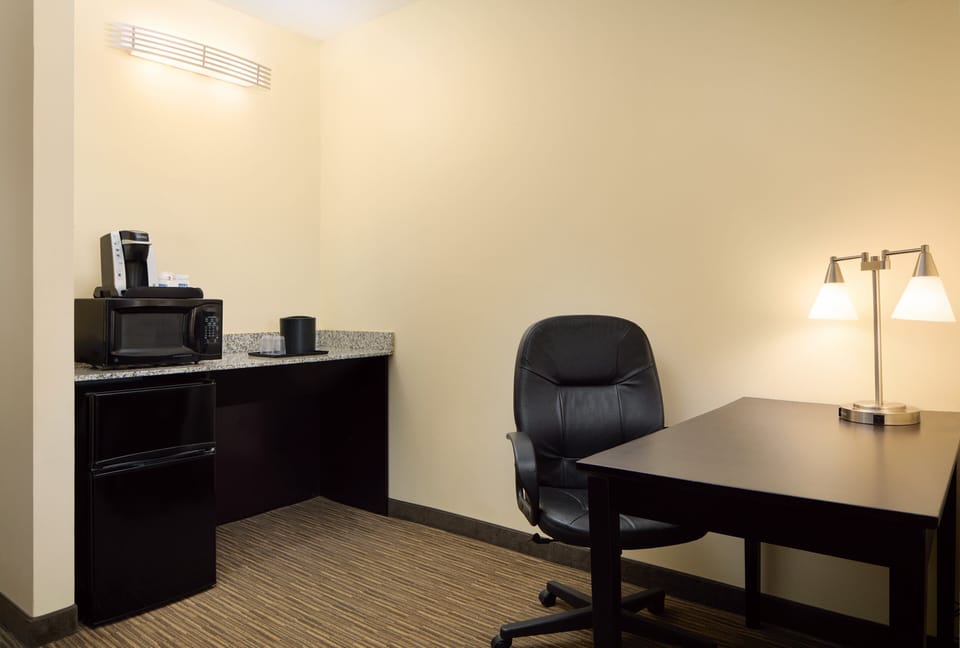 Premium bedding, pillowtop beds, desk, laptop workspace