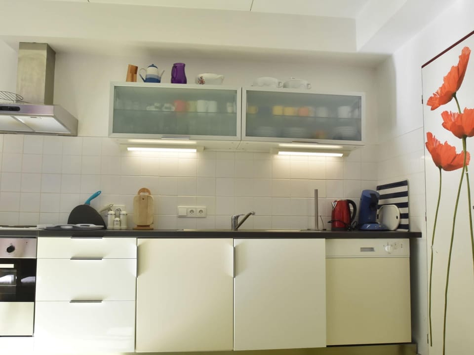 Bungalow | Private kitchen | Stovetop, highchair