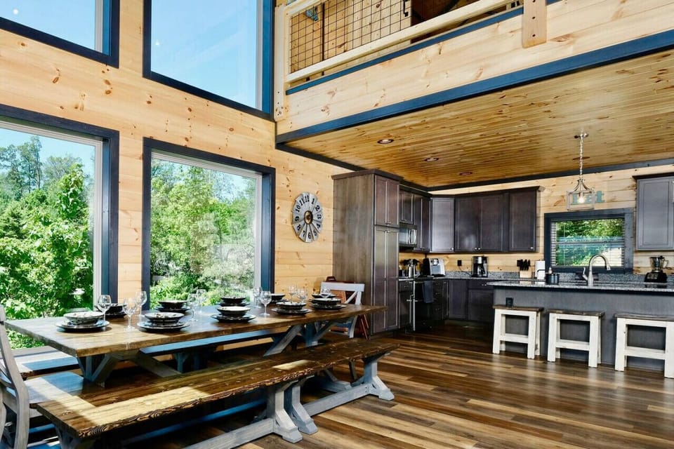The kitchen overlooks the open dining area and great room.