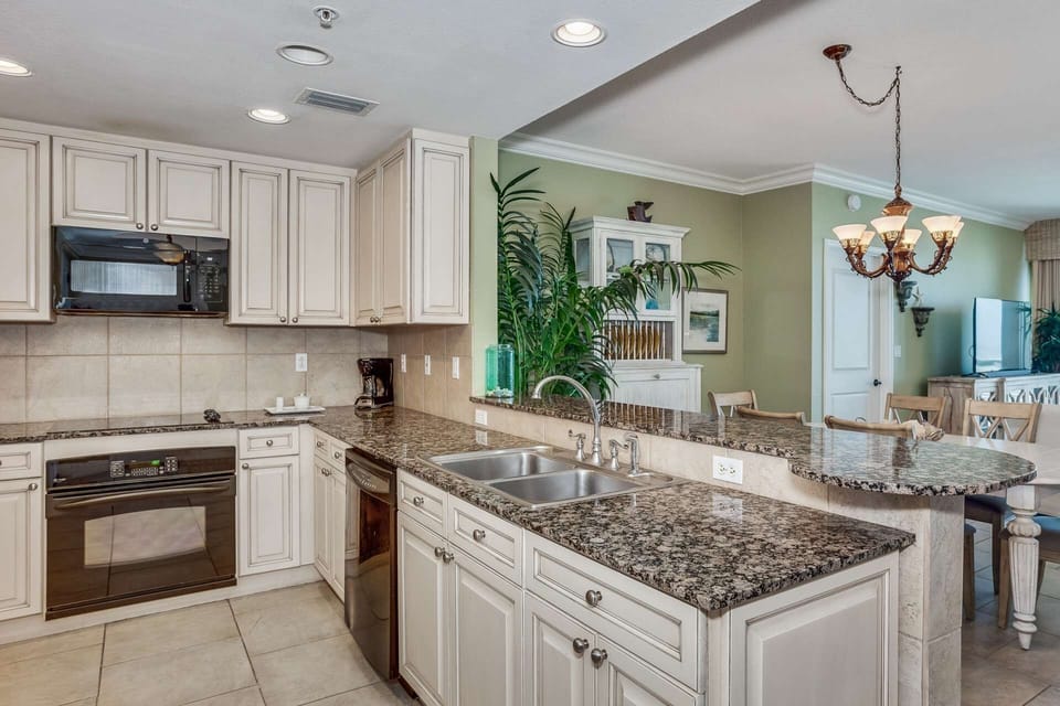 The kitchen is fully updated with granite counter tops