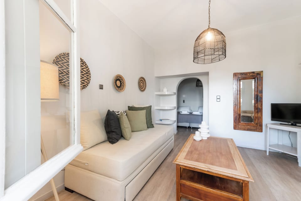 Standard Double Room | Living area | TV