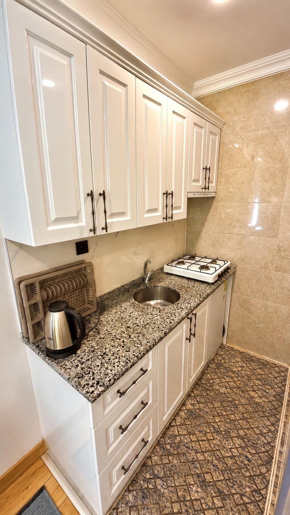 Deluxe Villa | Private kitchen | Fridge, stovetop, electric kettle, highchair