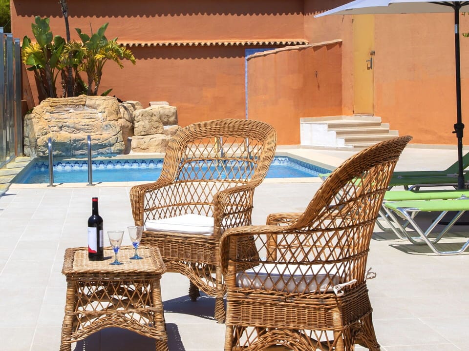 Furniture, Wicker, Chair, Outdoor Furniture, Outdoor Table, Property, Table, Patio, Room, Real Estate