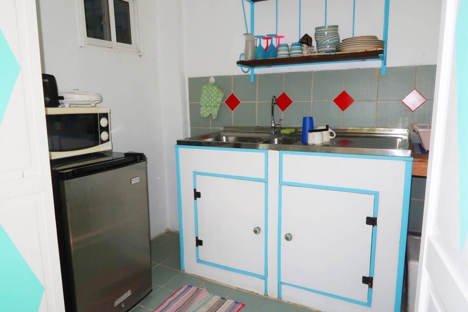 Coffee/tea maker, mini-fridge, microwave, stovetop