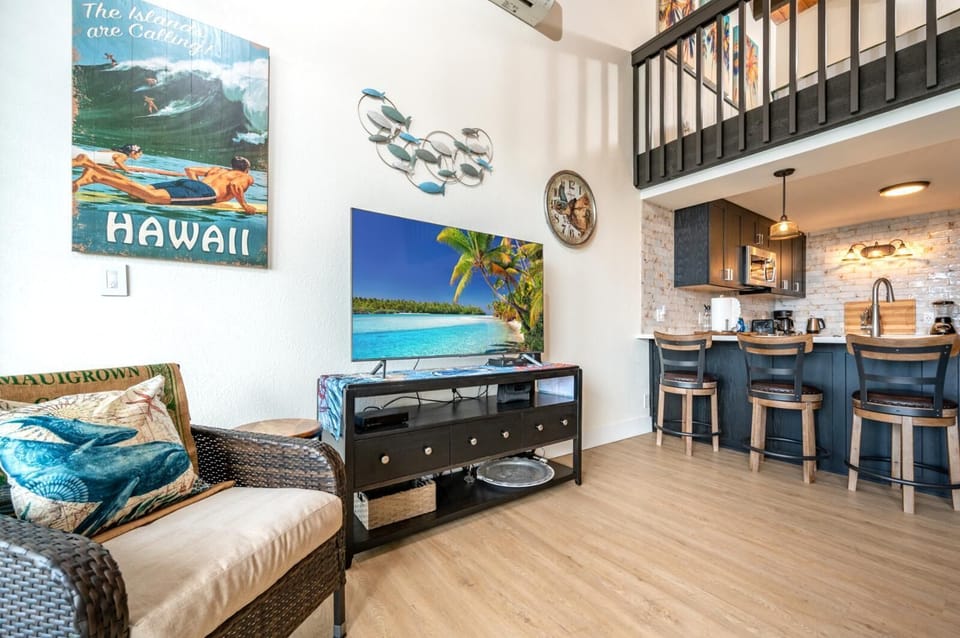 Retro surf vibes meet modern comfort in this cozy corner, with island flair, warm textures, and a beachy breeze    
