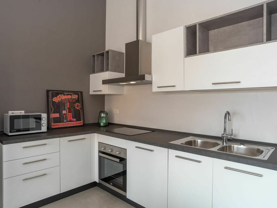 Cabinetry, Countertop, Furniture, Sink, Kitchen Sink, Property, Building, Tap, Kitchen Stove, Kitchen Appliance