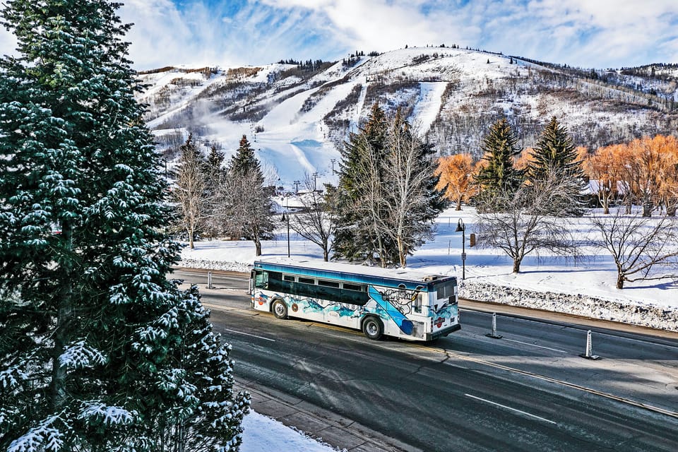 Winter landscape with shuttle transportation available to nearby ski slopes and mountain activities.