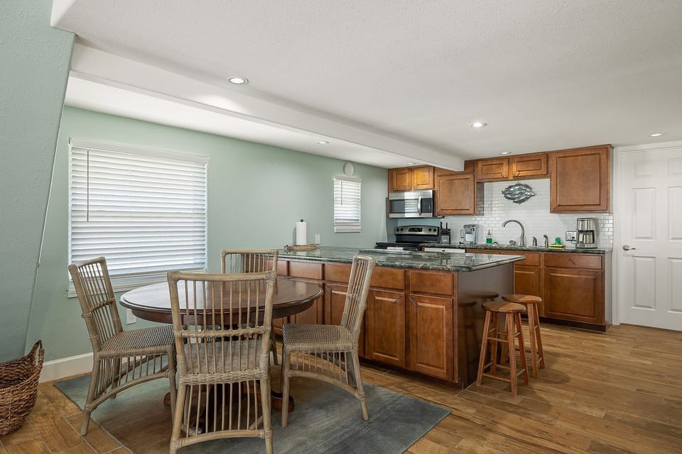 Open concept kitchen/ dining room.