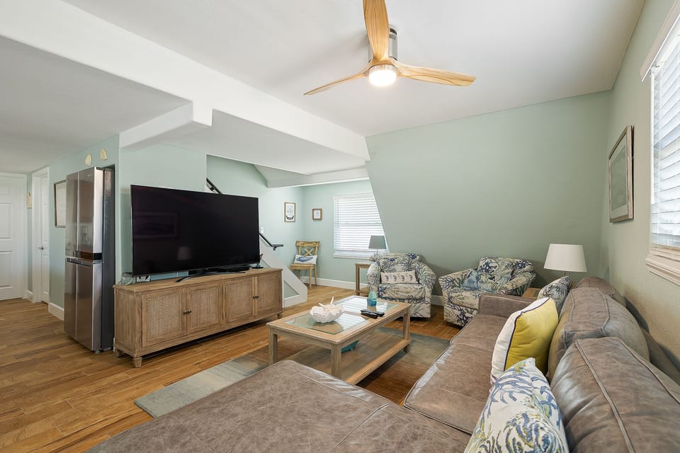 Living area surrounds a flat screen TV!