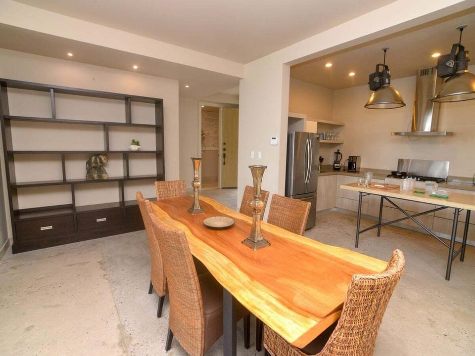 Gather around the dining room table at Casa Playa Vista in La Hacienda San Felipe BC MX — perfect for family dinners.
