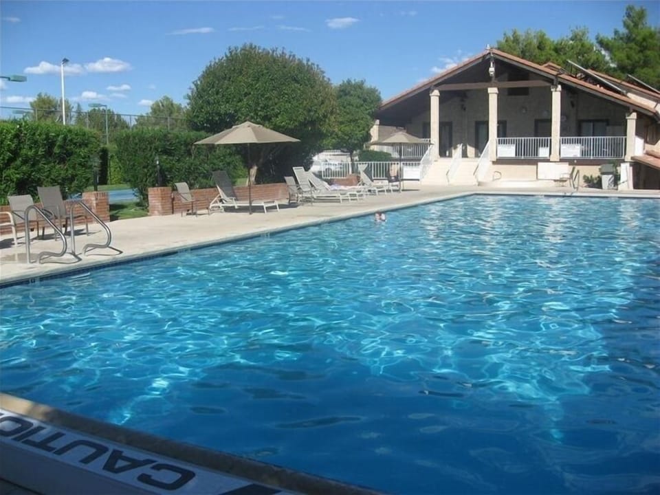 Heated outdoor pool at clubhouse.  Hot tub nearby.  Open year round.