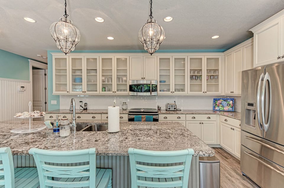 Blue Palm Paradise kitchen view from living room