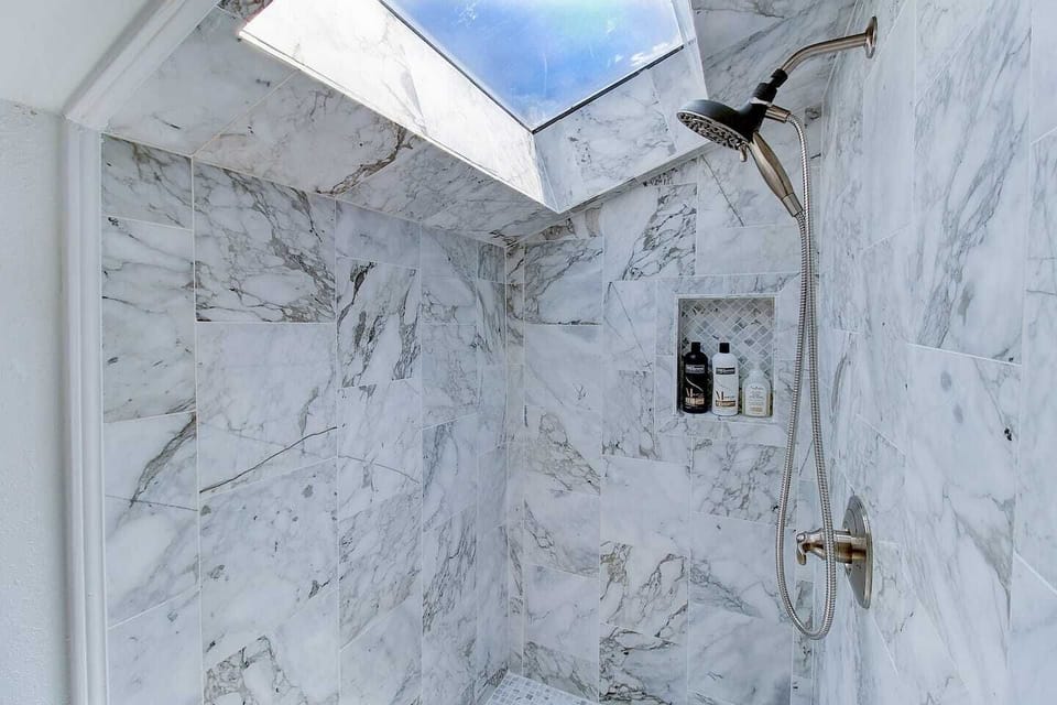 Marble shower with skylight