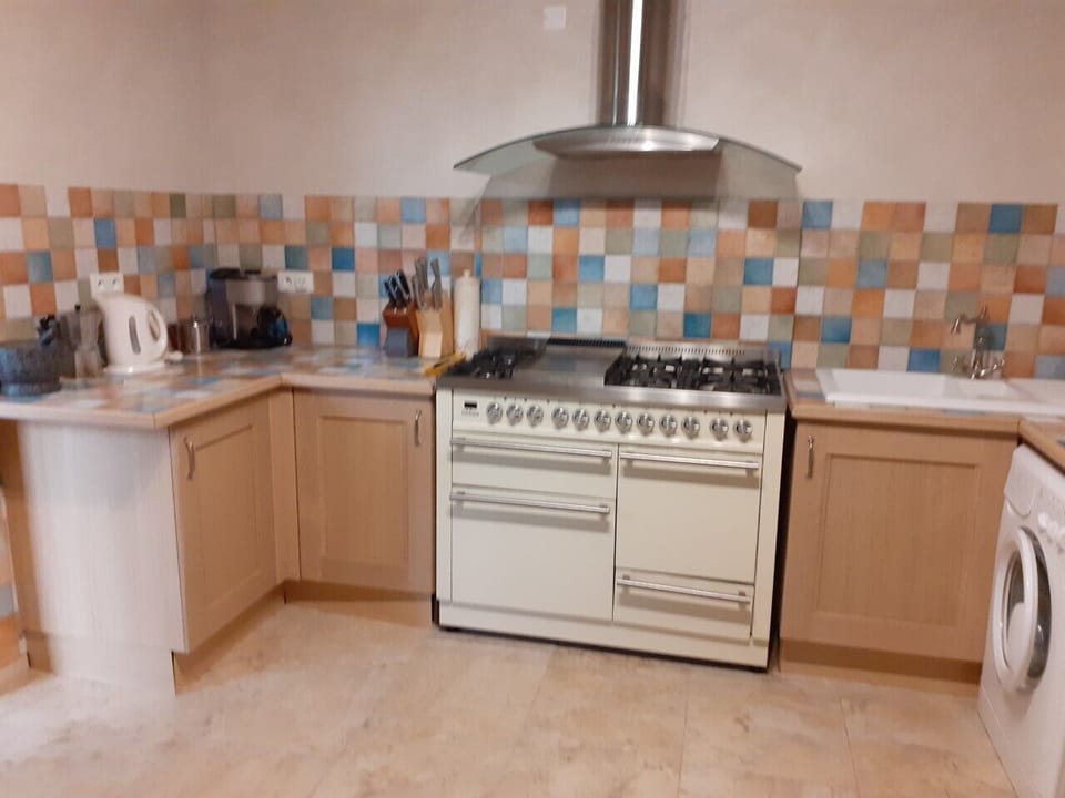range cooker in newly fitted kitchen