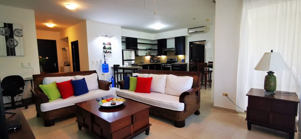The vast living room provides a sitting area with a 50 " 4K smart tv.