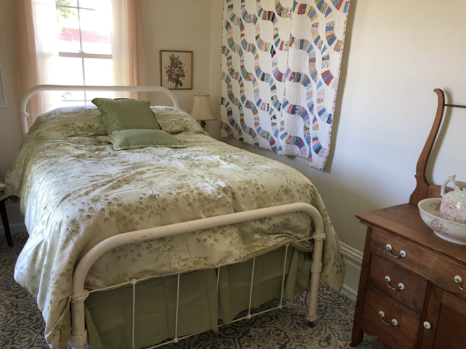 North bedroom downstairs with full size bed