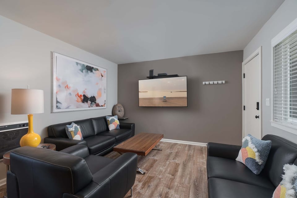 Living room with 65" flat screen t.v.