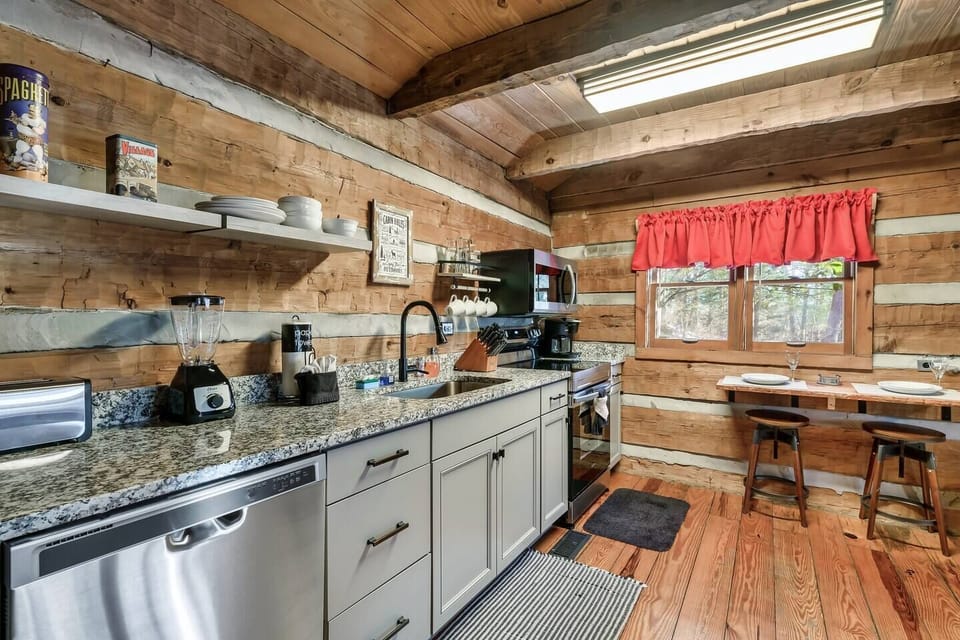 Your open-concept kitchen is fully equipped for your stay.