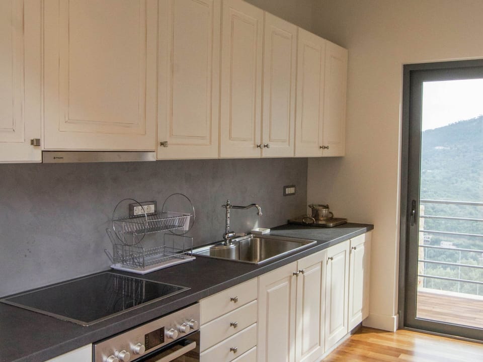 Villa | Private kitchen | Highchair, cookware/dishes/utensils