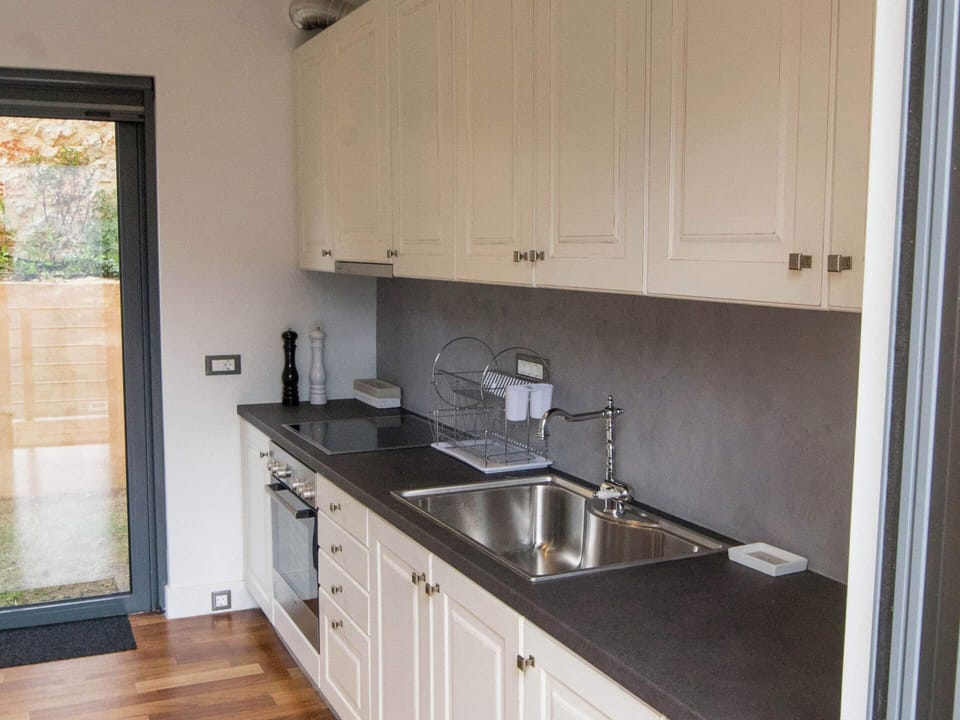 Villa | Private kitchen | Highchair, cookware/dishes/utensils