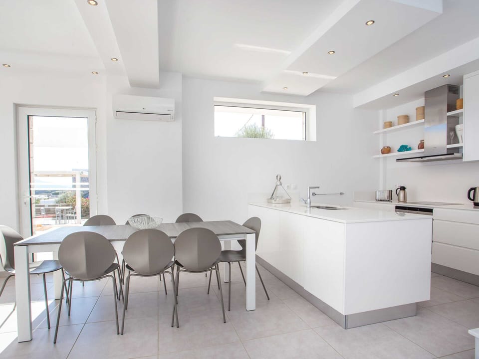 Villa | Private kitchen | Microwave, stovetop, dishwasher, highchair