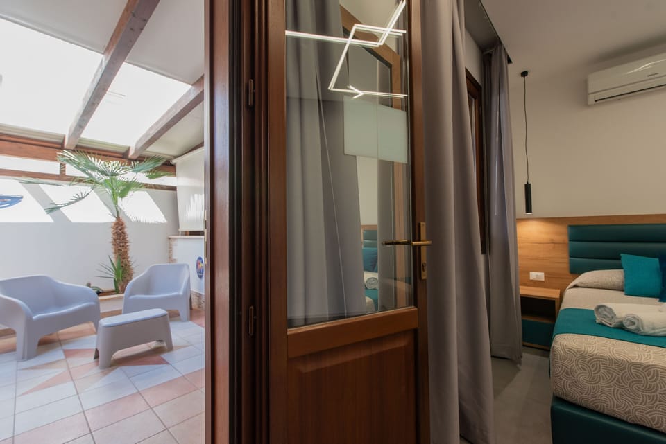 Double Room, Patio | 1 bedroom, premium bedding, down comforters, in-room safe