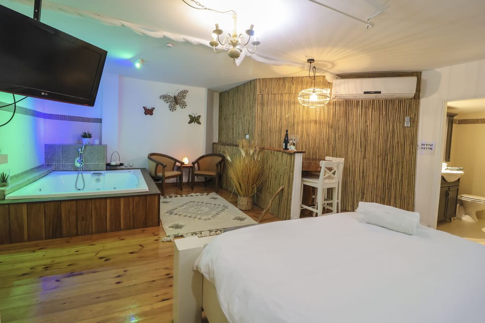 Villa, Valley View | Living area | 55-inch LCD TV with satellite channels, TV